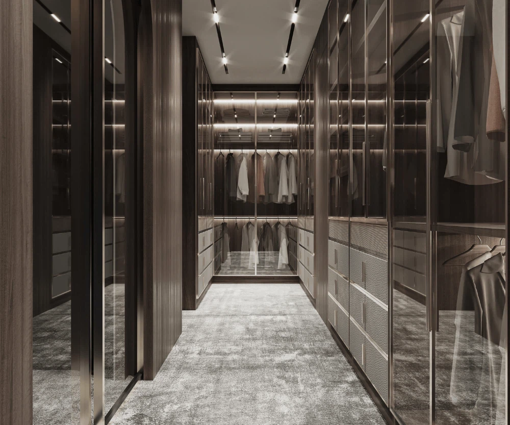 Contemporary glass walk in wardrobe with drawers and hanging space Contemporary glass walk in wardrobe with drawers and hanging space