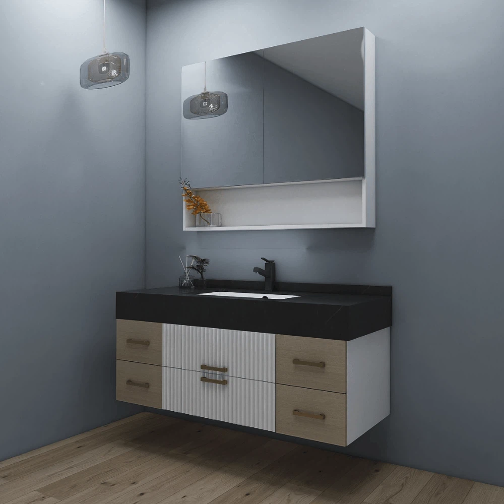 Floating bathroom vanity with mirror and pendant light, featuring black faucet and textured drawer fronts. Floating bathroom vanity with mirror and pendant light, featuring black faucet and textured drawer fronts.